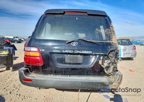 1999 Toyota Land Cruiser из США, поврежденный, VIN JT3HT05J6X0054462